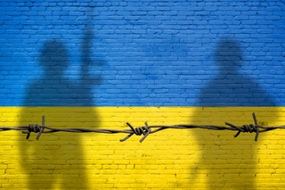Flag of Ukraine painted on a brick wall